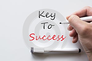 Key to success written on whiteboard