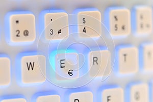 Keyboard of a computer with blue light photo