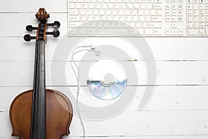 Keyboard computer with dvd disc and violin