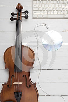 Keyboard computer with dvd disc and violin