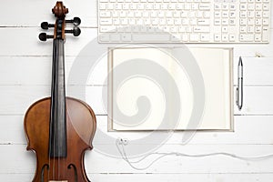 Keyboard computer with notebook and violin