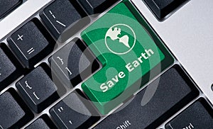 Keyboard with green key Save Earth