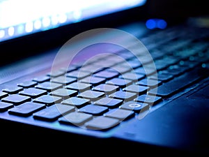 Keyboard illuminated by blue light