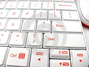 Keyboard with a key, wireless keybord mouse close up