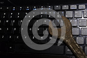 Keyboard Laptop with Wrench repair PC or laptop concept