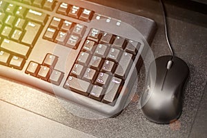 Keyboard with mouse on the table, business concept, soft focus, toning just sold