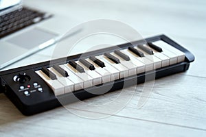 Keyboard musical instrument on a white floor