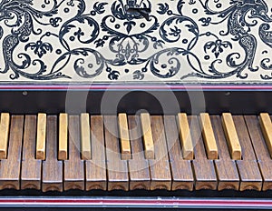 Keyboard of old harpsichord with brown keys