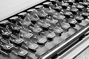 Keyboard of an old retro typewriter with the English alphabet.In black and white image