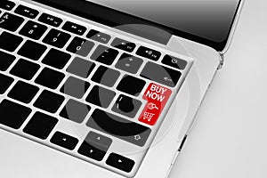 Keyboard with red buy now online shopping theme button