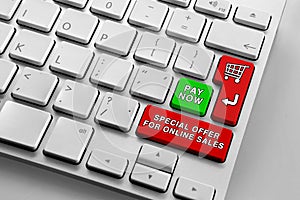 Keyboard with red and green online shopping theme buttons and magnifying glass