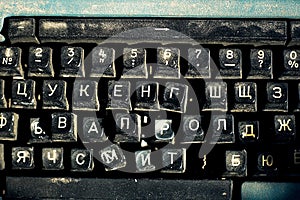 Keyboard with Russian letters of an old typewriter close-up.