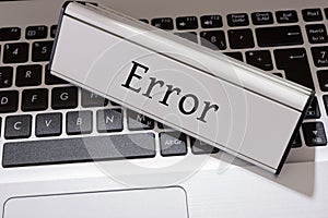 Keyboard and shield with the word Error