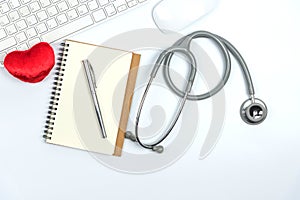 Keyboard,stethoscope,notepad and heart