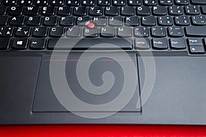 Keyboard with touchpad and trackpoint on the laptop