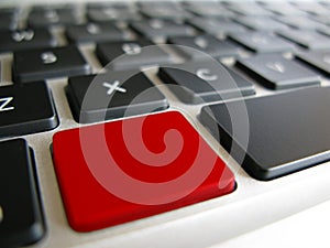 Keyboard with a warning red key