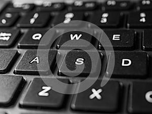 Keyboard white / gray / black laptop. Laptop keyboard. Laptops are mobile. Black keyboard on a gray laptop. keyboard close up with