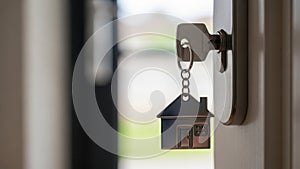 Keychain house key in door lock