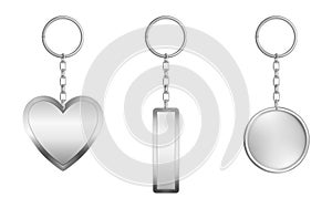 Keychains set. Metal round, rectangular and heart