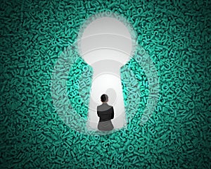 Keyhole on green big data background with businessman sitting