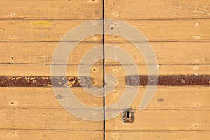 Keyhole on a old wooden door.