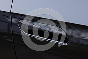 Keyless entry car door handle with keyless go touch sensor. Car door handle. Access button. Automatic opening of a car