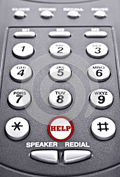Keypad of a telephone with a red button for help