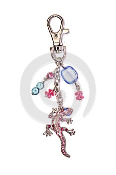 Keyring gekko with glass beads isolated on white background