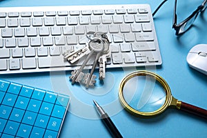 Keys with a business objects on the blue background