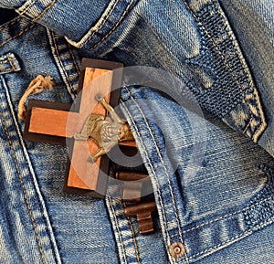 Keys, cross in jeans pocket