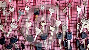 Keys hanging in the locksmith wall