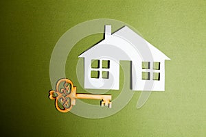 keys and house on a green background