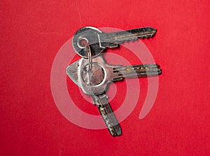 Keys on a key chain. Keys used for opening doors seen from above