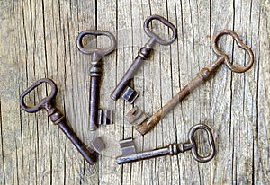 Keys on a wooden background, real estate investment