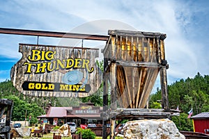 Keyston, South Dakota, USA - 8/2020:  Big Thunder Gold Mine entrance sign, a popular tourist attraction