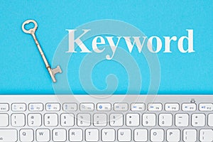 Keyword message with gray keyboard with a vintage skeleton key