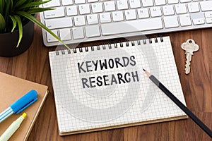 Keywords research words on notebook