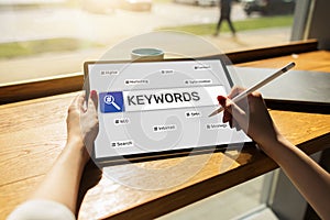 Keywords. SEO, Search engine optimization and internet marketing concept on screen.