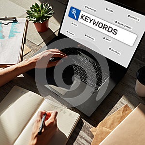 Keywords. SEO, Search engine optimization and internet marketing concept on screen.