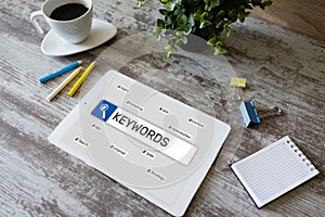 Keywords. SEO, Search engine optimization and internet marketing concept on screen.