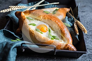 Khachapuri - Georgian cheese and egg filled bread