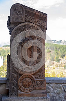 Khachkar is a type of Armenian architectural monuments , which is a stone stele with a carved image of the cross