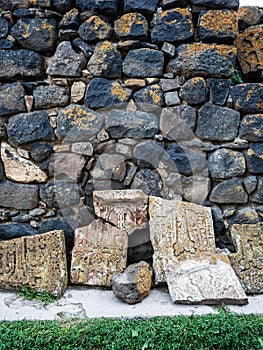 Khachkars along wall in Sevanavank Sevan Monastery