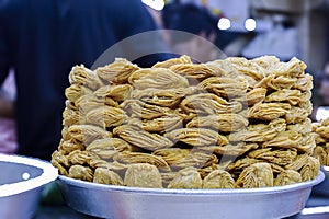 Khaja the Sweets made with flour dough layer by layer then fried and dipped in sugar syrup becoming sandy delicious tasty dessert