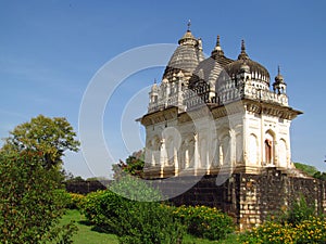 Khajuraho Temple Group of Monuments in India with erotic sculptures on the wall