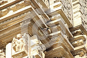 Khajuraho temples, Kamasutra images portrayed in the sculptures on the monuments