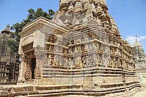 Khajuraho temples, Kamasutra images portrayed in the sculptures on the monuments photo