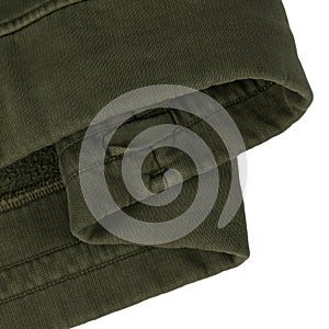 Khaki cotton sweatshirt bottom with drawstrings. Close up