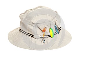 Khaki hat with fishing tackle photo