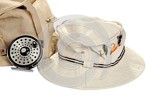 Khaki hat with fly fishing equipment